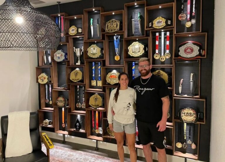 Gordon Ryan Pictured With Nathalia Santoro In Their Trophy Room