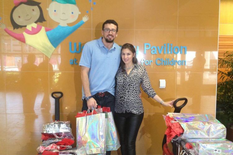 Hedo And Banu Pictured At A Hospital Providing Gifts To The Patients In 2013