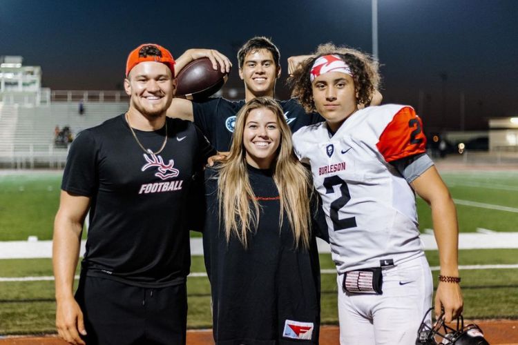 Jordan Kitna(L) Pictured With His Siblings At Burleson High School Stadium In 2021