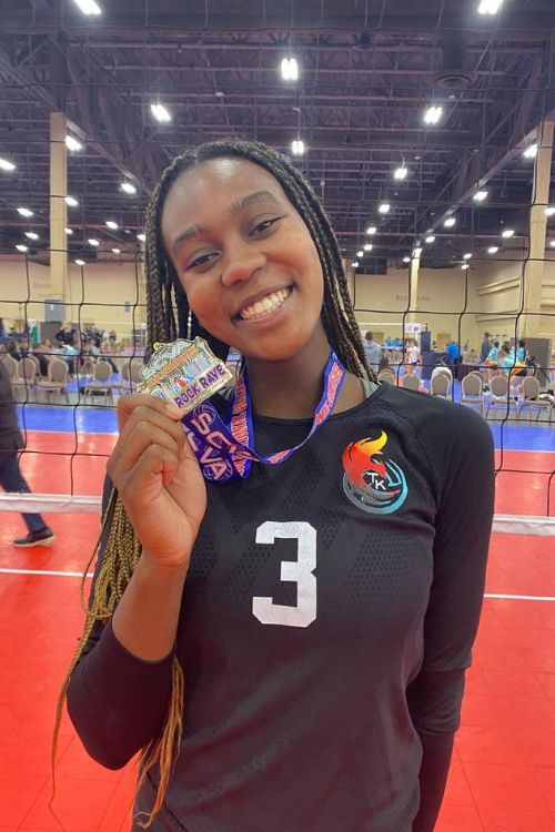 Maya Shows Off Her Medal Won In A Volleyball Tournament In 2021