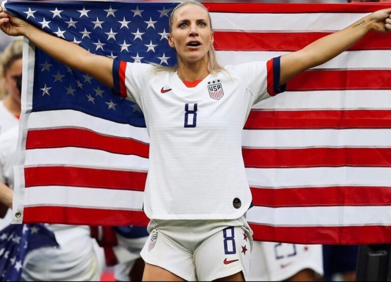 Julie Ertz Proudly Holds The US Flag As She Announces Her Return To The Roster In 2021