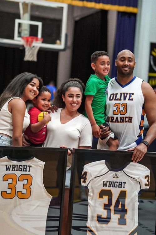 KJ Wright Pictured With His Family, Including His Wife, Nathalie And His Three Kids As He Is Honored By His High School