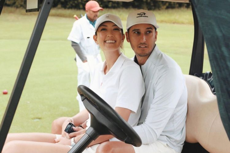 Michelle Gives A Wide Smile To The Camera As She Enjoys A Day Of Golf With Her Partner Jonnie West 