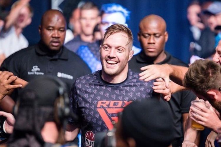 Niel du Plessis Makes His Way Through The Crowd At An EFC Event In 2019