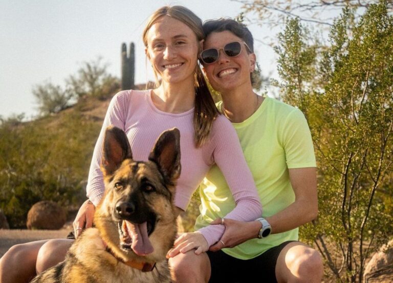 Nikki Hiltz Pictured With Their Partner Emma Gee And Their German Shephard Scout