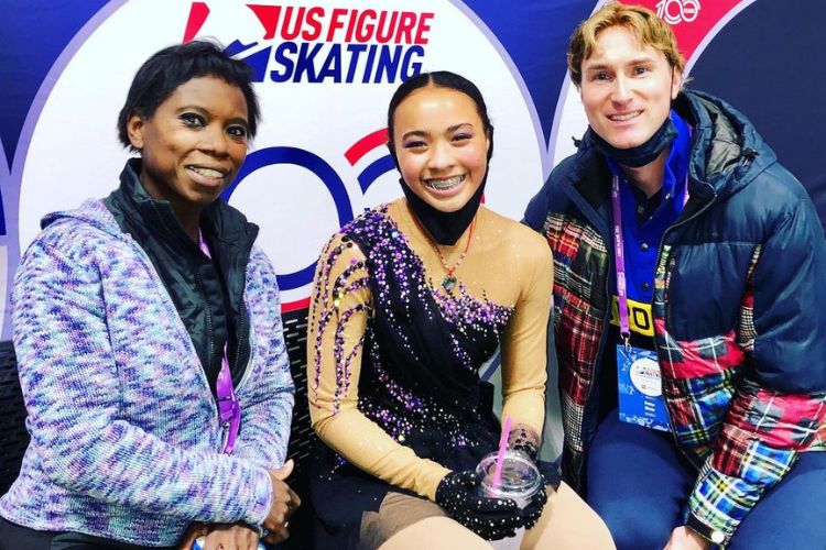 Surya Bonaly And Peter Biver Pose With One Of Their Students In 2021 US Figure Skating Competition 