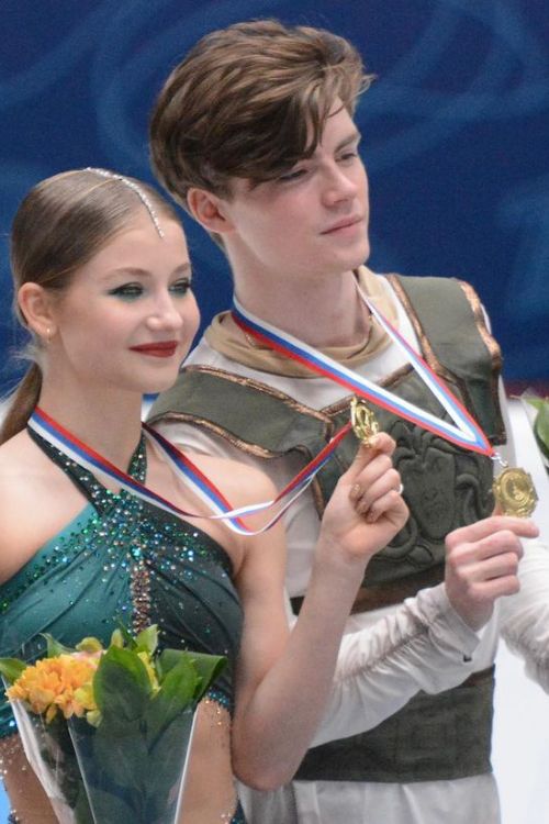 Vasilisa And Valeriy Show Their Winners Medal As They Win The Russian Grand Prix