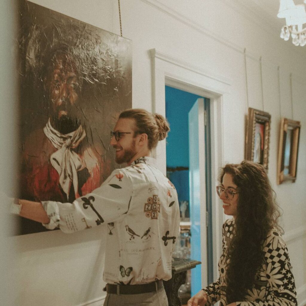 Chase And His Wife Brooke With Their Painting