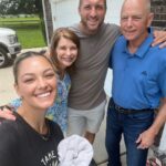 Tim With His Parents And Wife