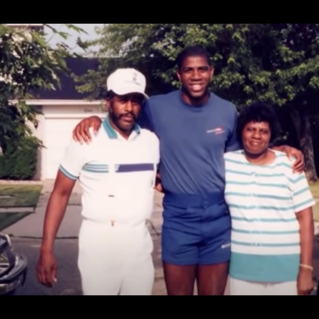 Young Magic Johnson With His Parents