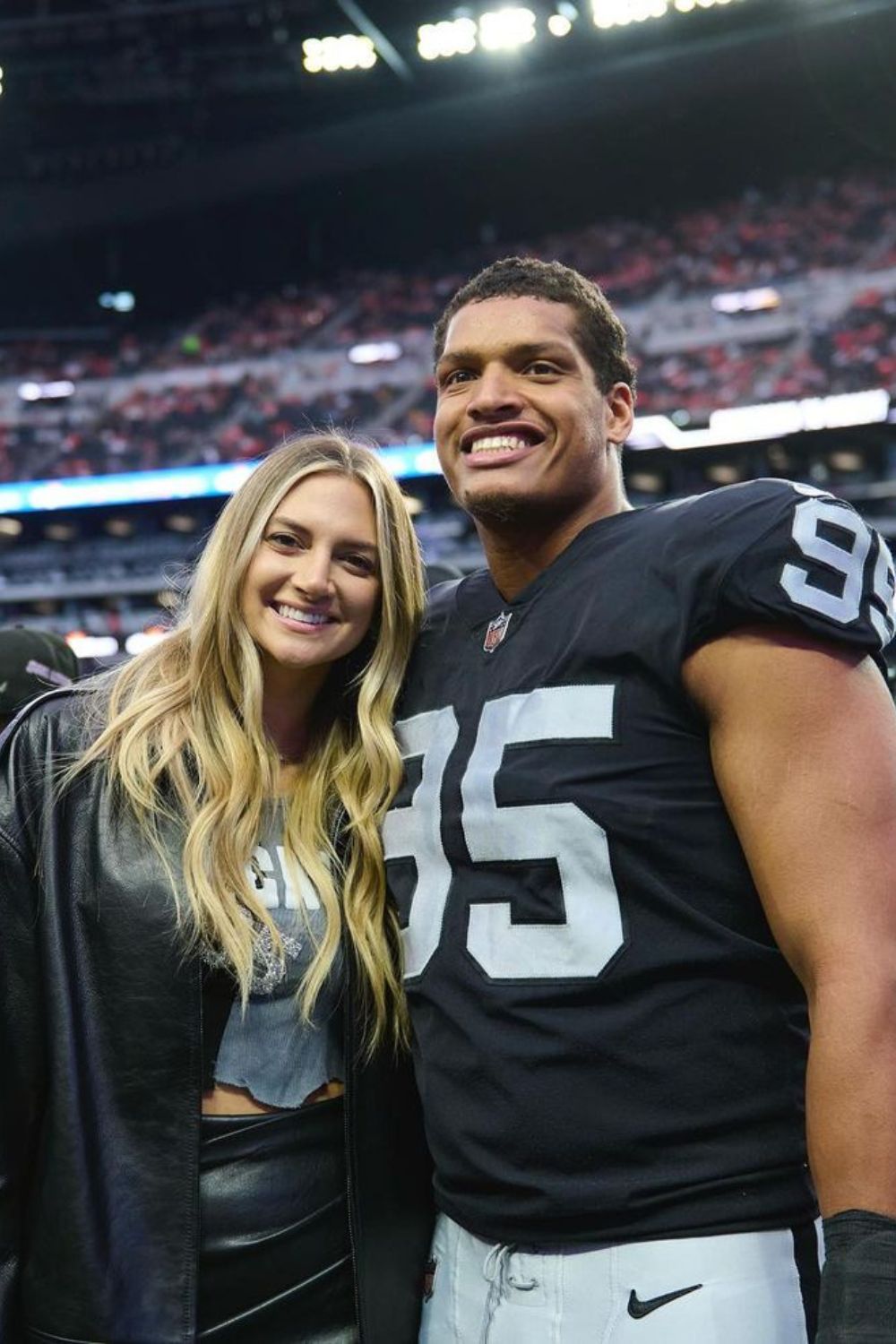 American Football Defensive End Isaac Rochell With His Wife