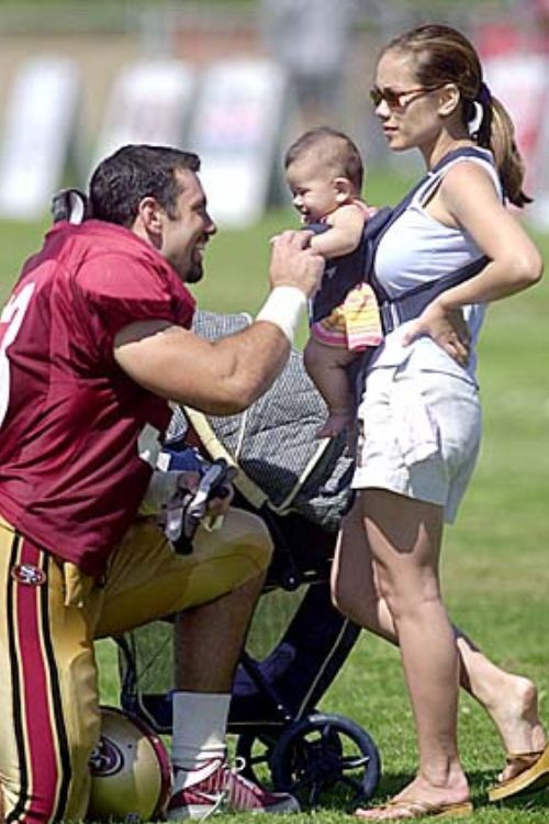 Jeff Ulbrich With His Wife Cristina And Their Baby