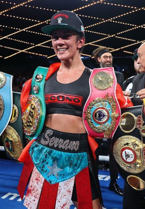 Amanda Serrano Holding Her Winning Belts 