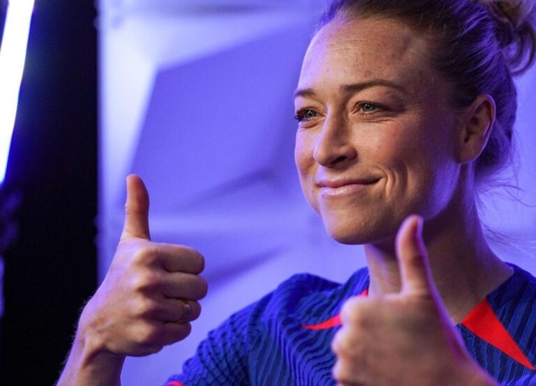 Emily Sonnett Gives A Thumbs Up To The Camera As She Wears The New Nike Kit For The National Team