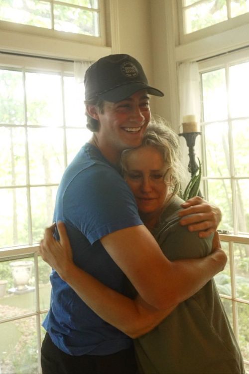 Garrett Clark Hugs His Mother, Tamara Clark After Presenting Them With A $100,000 Cheque In 2022