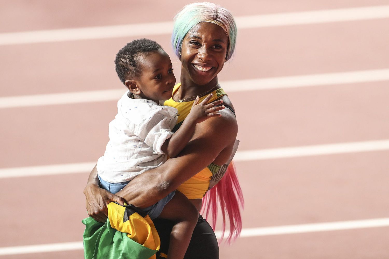 Shelly Ann Fraser Pryce With Her Kid 