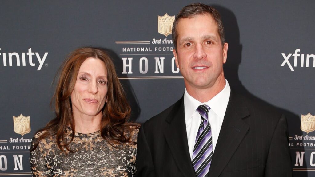 John Harbaugh With His Wife Attending A Event