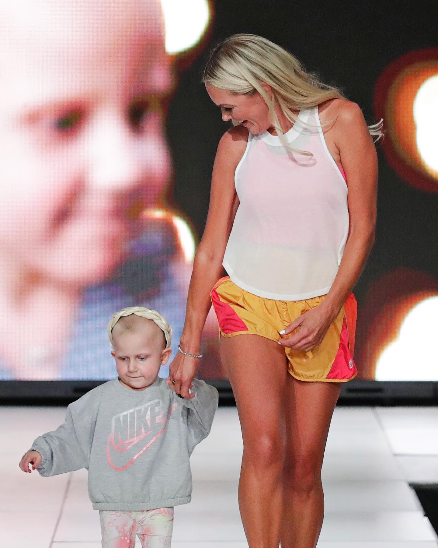 Sherry Pollex At The Catwalk For A Cause Event With A Child