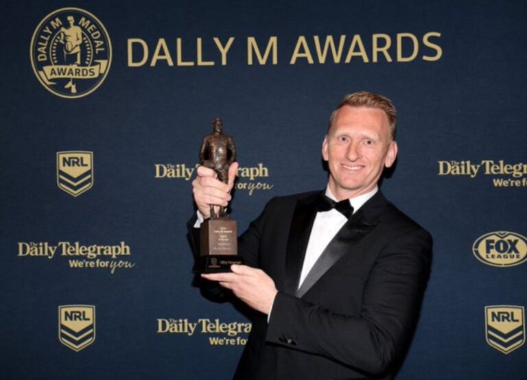 Andrew Webster Pictured Holding The Dally M Coach Of The Year Award