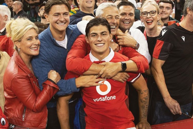 Louis Rees-Zammit Pictured With His Family, Including Parents, And His Older Brother, Tyler, Celebrating After The Game Against England In August 