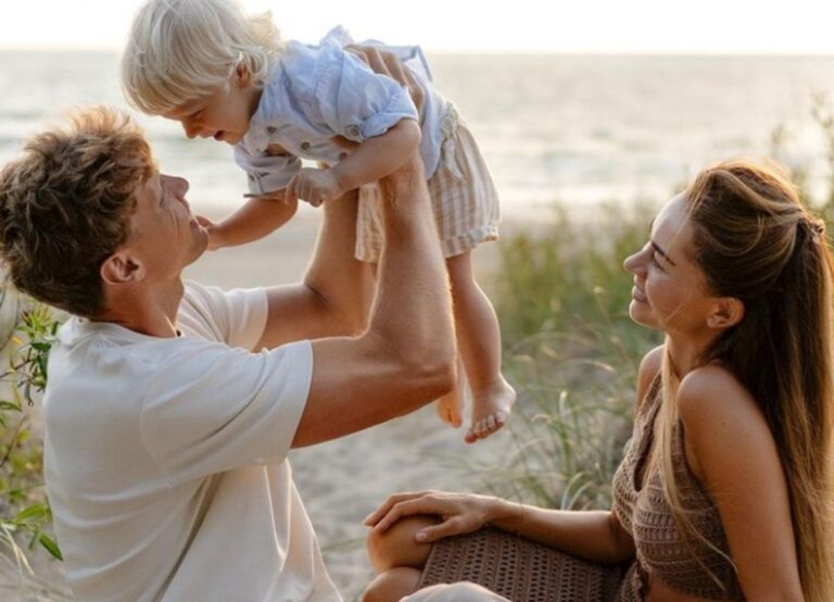 Mindaugas Kuzminskas Pictured With His Wife, And Their Son, Jonas