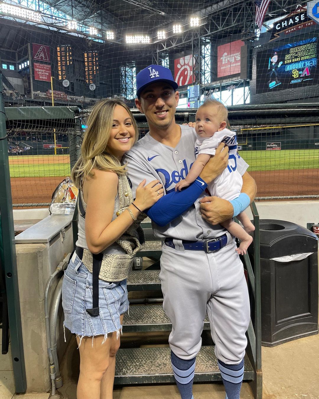 Austin With His Wife And Son After A Game