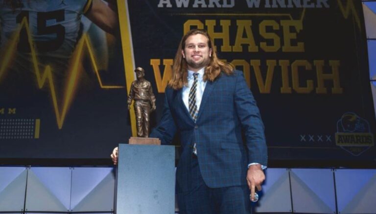 Chase Winovich Receiving An Award