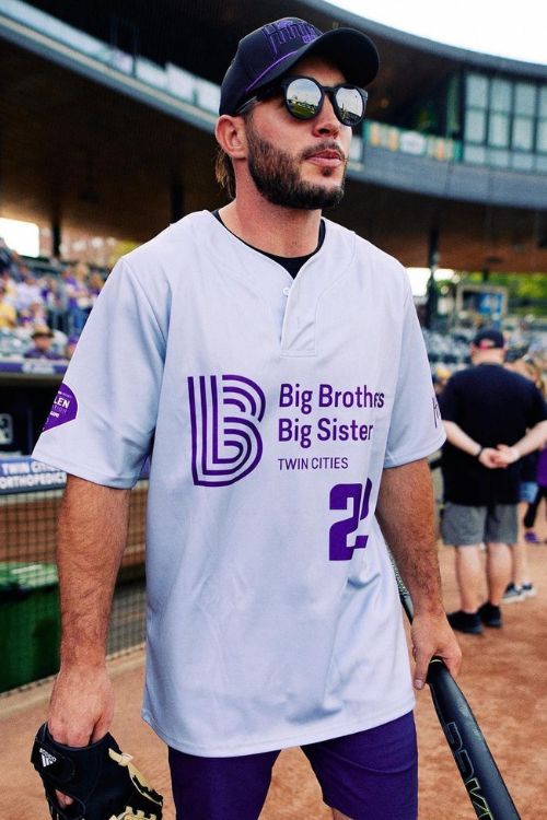 Harrison proudly dons the Big Brother Big Sister jersey, expressing his heartfelt gratitude for being a part of something special