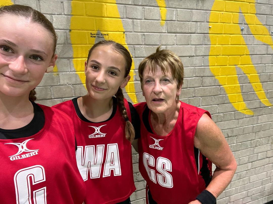 Molly And Sophie Playing Netball With Their Nana