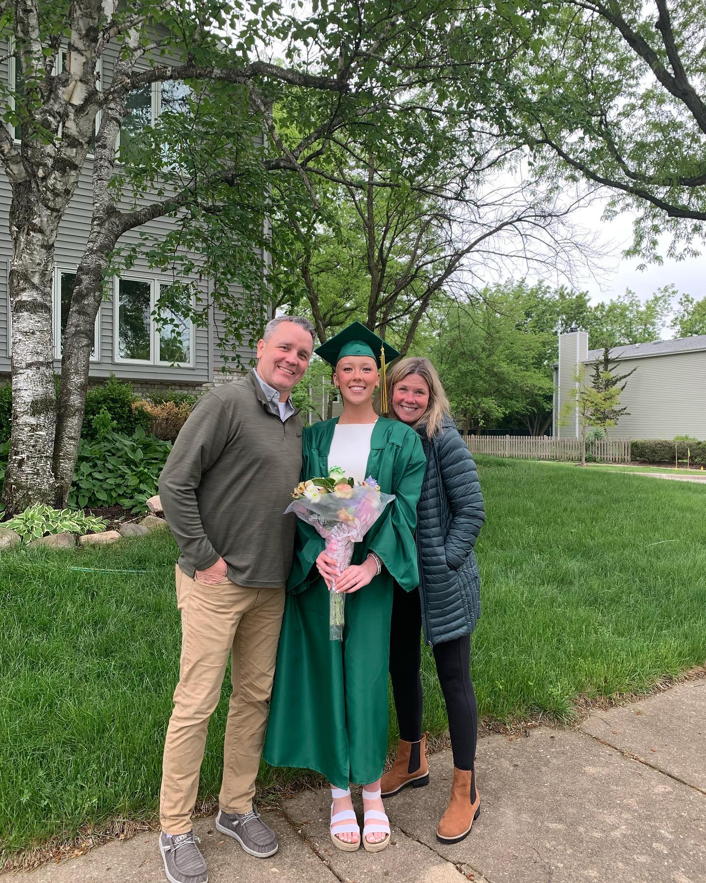 Rylen Reid With Her Parents At Her High School Graduation