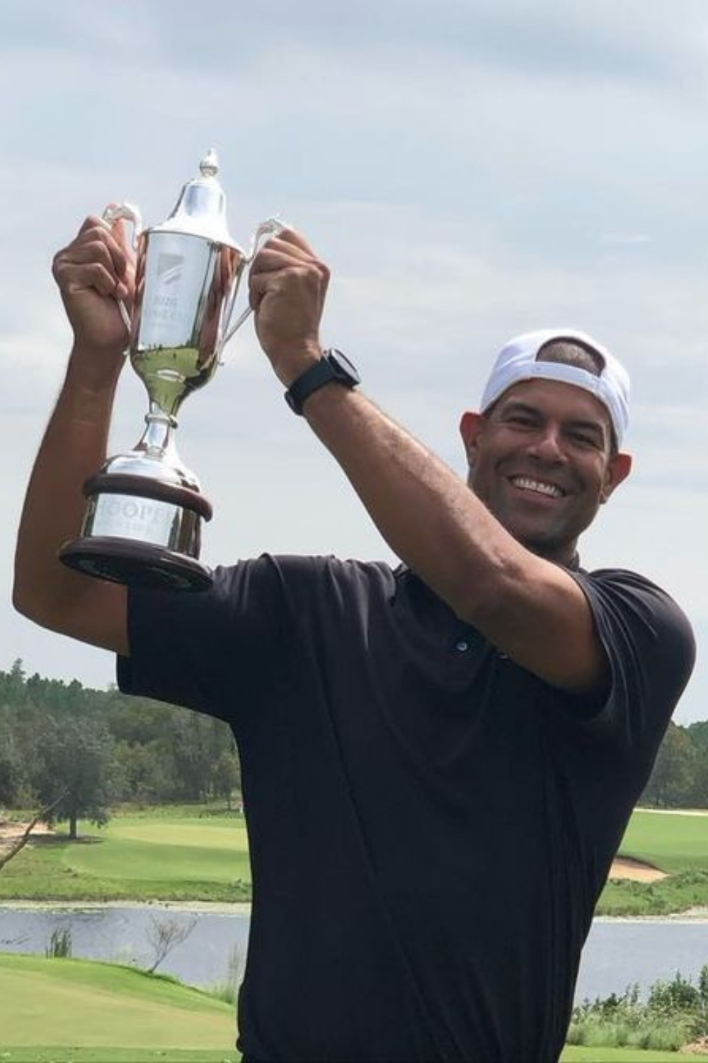Shane Battier Holding The Commissioners Cup For An Auction