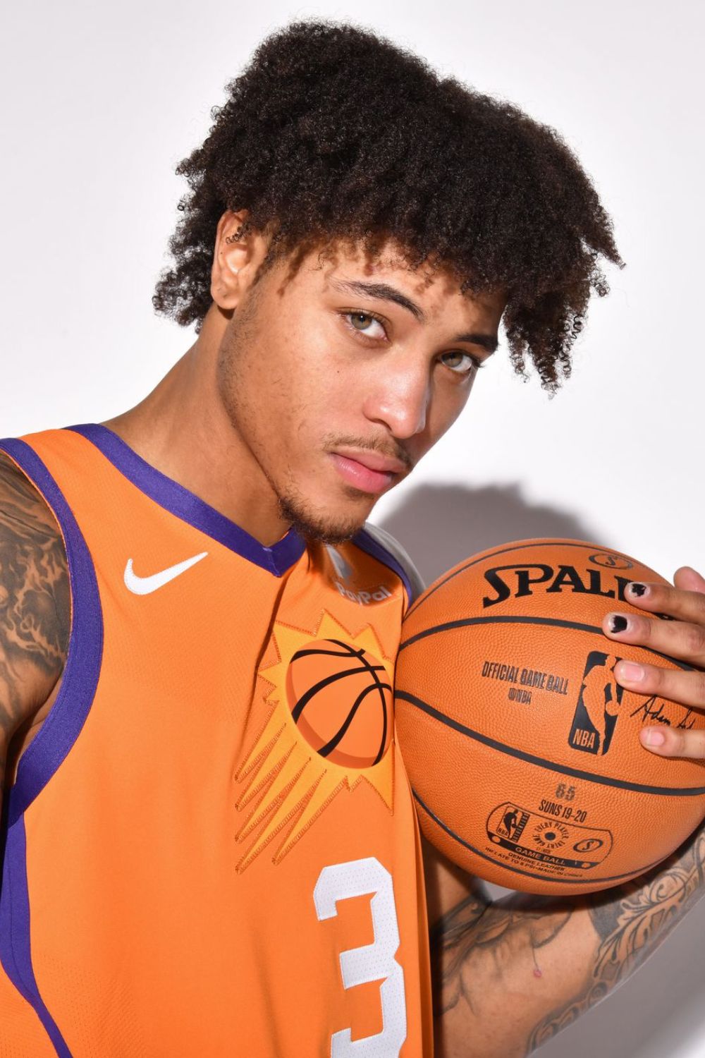 Kelly Oubre Posing For A Photo 