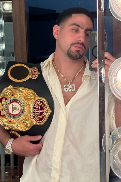 Danny Garcia Poses With His Belt To Remind His Fans His Greatness 