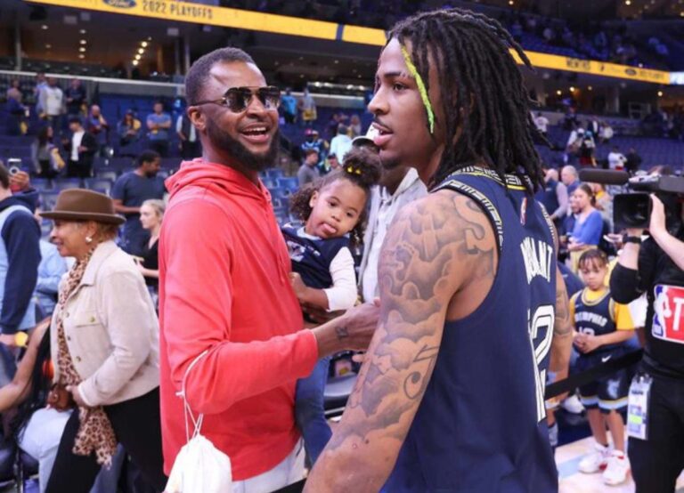 Tee Morant Pictured Celebrating With His Son And NBA Superstar Ja Morant After A Grizzlies Win