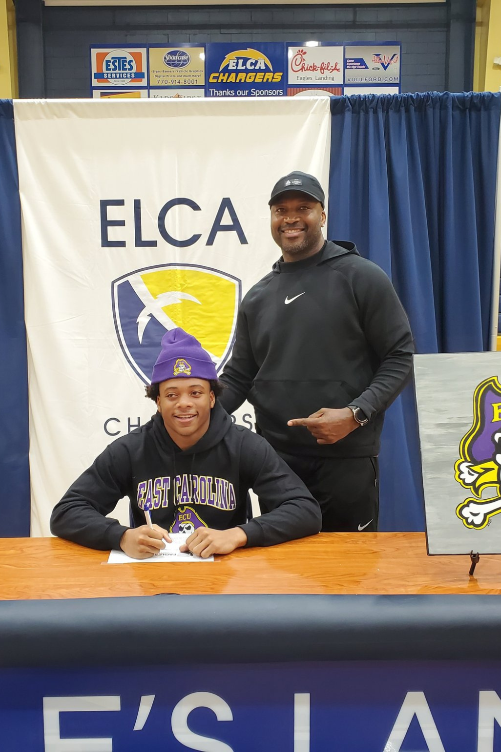 Anthony With Keaton As He Signs Letter Of Intent With East Carolina