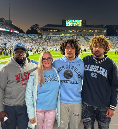 Elliot, Alongside His Parents and Brother, Delights in a North Carolina Football Team Match