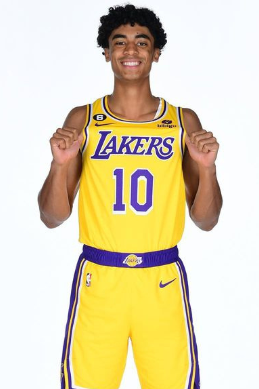 Max Christie Poses After Signing With The Lakers