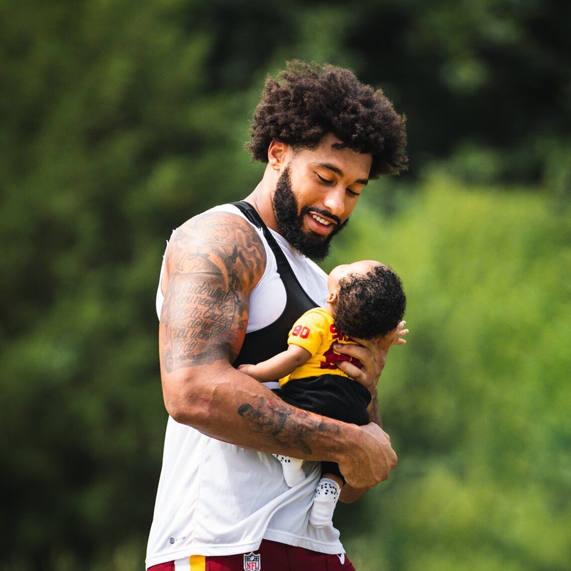 Montez Sweat Playing With His Son Shiloh