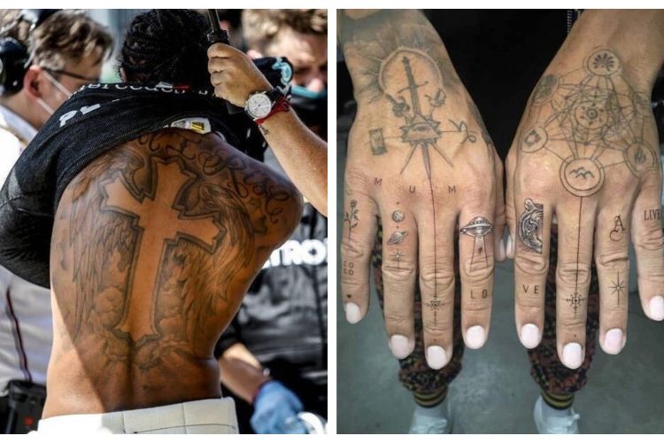 Lewis Hamilton Has A Big Cross And Angel Wings On His Back, And Last Year Debuted His New Inkings On His Fingers 