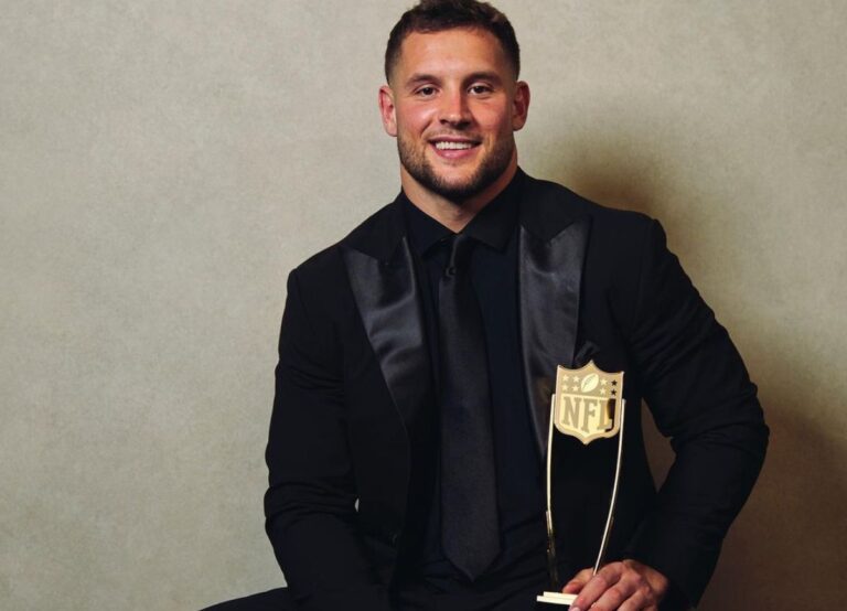 The 49ers Defensive End Nick Bosa Poses With His Defensive Player Of The Year Trophy