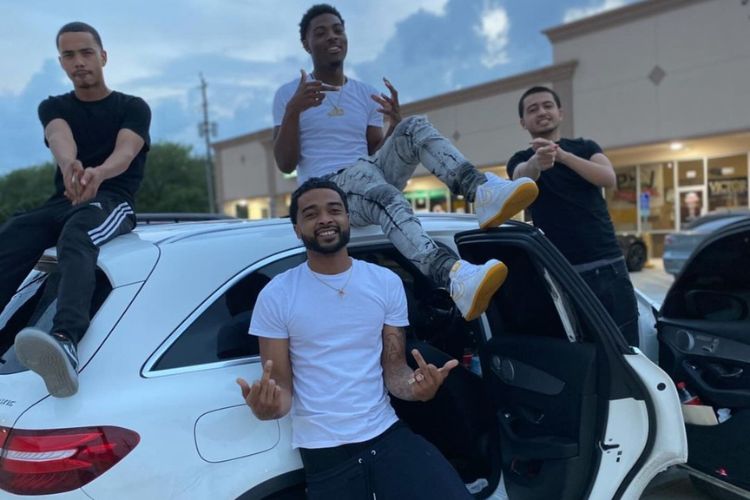 Shootergang VJ (Right On Top Of The Car) Pictured With His Friends Earlier This Year 