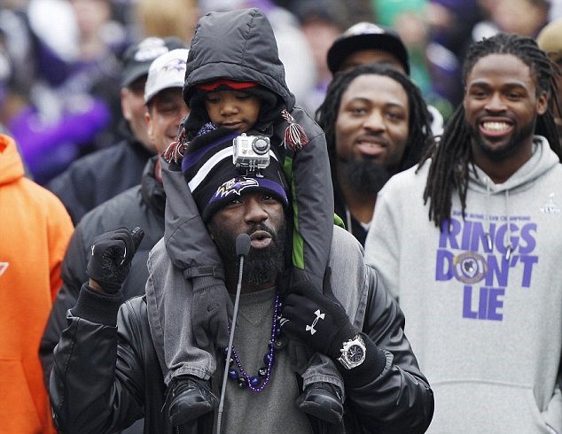 Ed Reed With His Son Edward In A Parade