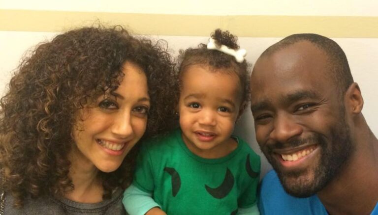 Retired NBA Player Emeka Okafor With His Wife & Daughter