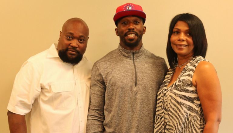 Tyrod Taylor And His Parents Rodney (Left) and Trina (Right) Flaunt Happy Faces When The Quarterback Signed With Buffalo Bills In 2016