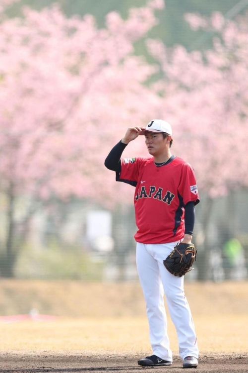 Yoshinobu Yamamoto Donning The Japenese National Baseball Jersey