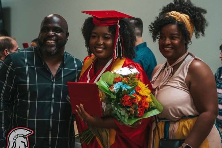 Earnest Graham Pictured With His Wife, Alicia And His Daughter, Aiyana During Her Graduation Ceremony In 2021