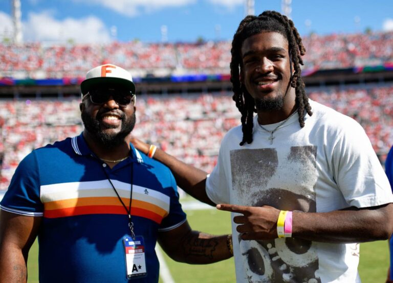 Earnest Graham Pictured With His Son Myles Graham At Ben Hill Griffin Stadium