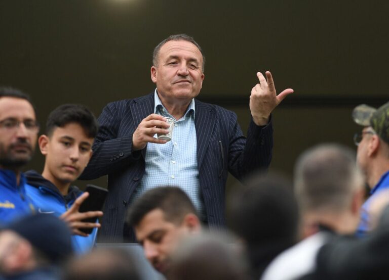 Faruk Koca Looks At The Crowd As He Sips His Drink One Of MKE Ankaragucu's Games