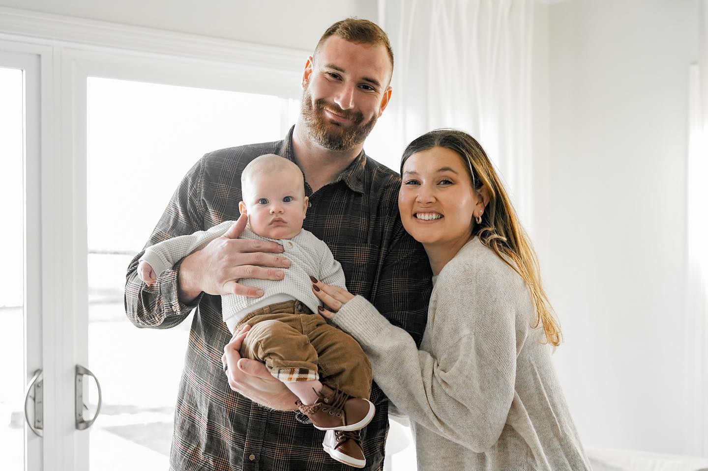 Frank Ragnow And Lucy Ragnow With Their Son 