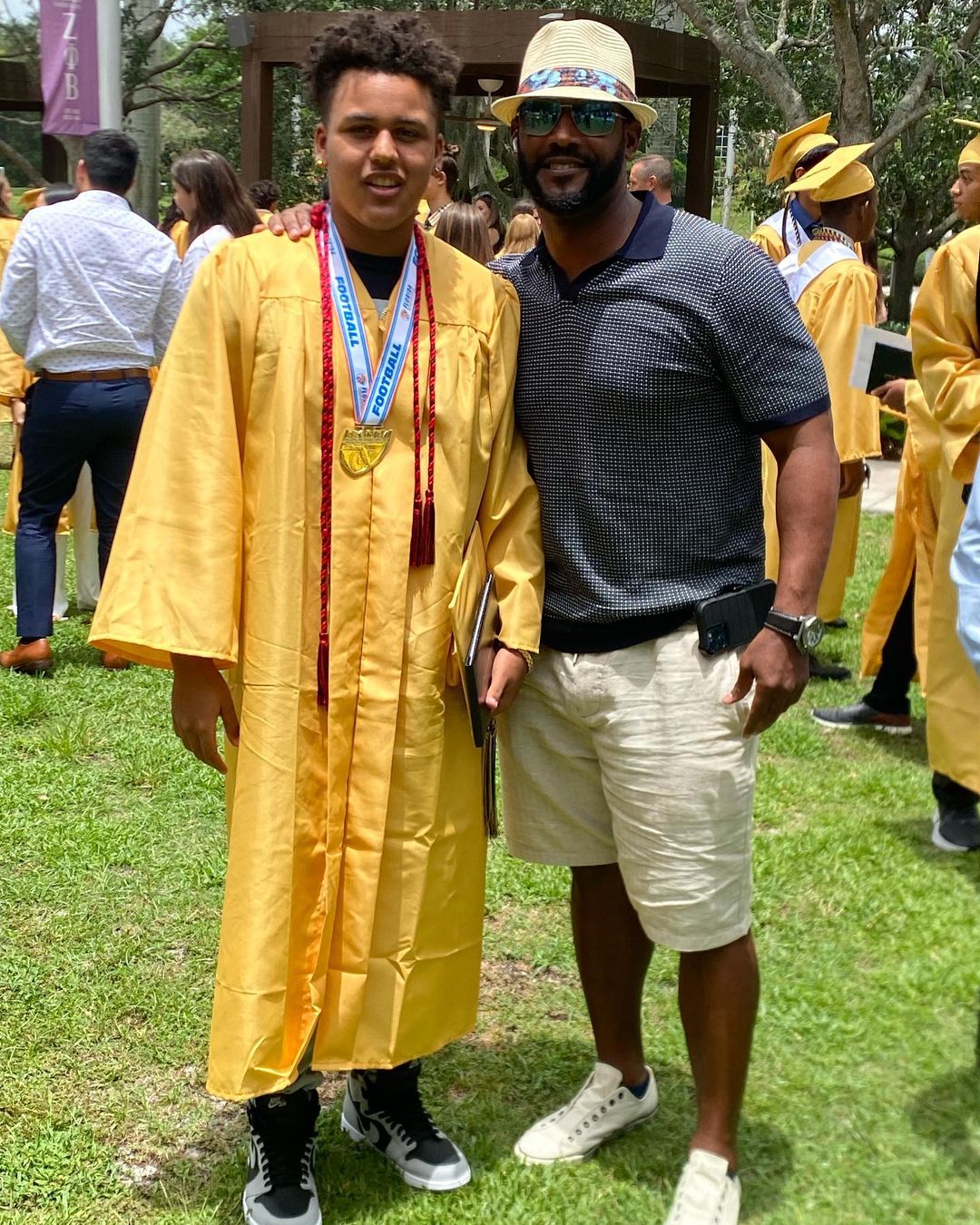 Ty Law With His Son Ty Jr. At His High School Graduation